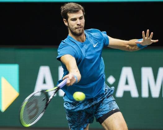 ROTTERDAM Karen Khachanov RUS in action against Stan Wawrinka SUI on the second day of the ABN AMRO World Tennis Tournament in Rotterdam, The Netherlands, 02 March 2021 The ATP tournament in Ahoy takes place without an audience due to the corona pandemic ANP KOEN SUYK xVIxANPxSportx xxANPxIVx 428793243