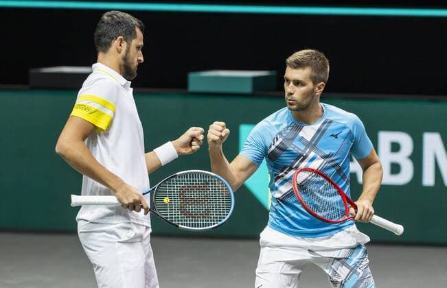 ROTTERDAM Mate Pavic l and Nikola Mektic KRO in action against Robin Haase and Matwe Middelkoop NLD on the second day of the ABN AMRO World Tennis Tournament The ATP tournament in Ahoy takes place without an audience due to the corona pandemic ANP KOEN SUYK xVIxANPxSportx xxANPxIVx 428794579