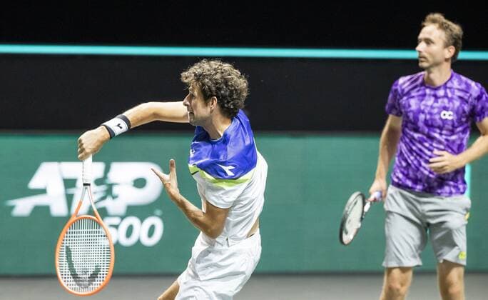 ROTTERDAM Robin Haase l and Matwe Middelkoop NLD in action against Mate Pavic and Nikola Mektic KRO on the second day of the ABN AMRO World Tennis Tournament The ATP tournament in Ahoy takes place without an audience due to the corona pandemic ANP KOEN SUYK xVIxANPxSportx xxANPxIVx 428794596