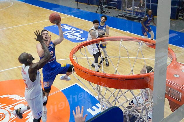 Basketball 1 Bundesliga, season 2020 2021, 20 matchday, Syntainics MBC Weissenfels vs JobStairs GIESSEN 46ers 03 03 2021 102 81 50 39 Michal Michalak MBC Weissenfels, back number 23 re against Brandon Bowman Forward Giessen 46ers, back number 15 at the basket during the match MBC Weissenfels vs Giessen 03 03 2021 Weissenfels Saxony Anhalt Germany Stadthalle Weissenfels
