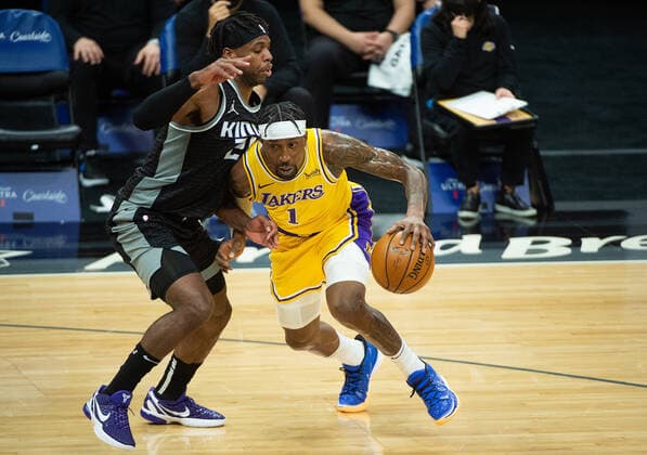 March 3, 2021, Sacramento, CA, USA: Los Angeles Lakers guard Kentavious Caldwell-Pope (1) drifters against Sacramento Kings guard Buddy Hield (24) in the first quarter during a game at Golden 1 Center on Wednesday, Mar. 3, 2021 in Sacramento. Sacramento USA - ZUMAj89_ 20210303_zaf_j89_002 Copyright: xPaulxKitagakixJr.x