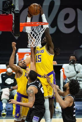 March 3, 2021, Sacramento, CA, USA: Los Angeles Lakers center Montrezl Harrell (15) scores over Sacramento Kings guard Cory Joseph (9) in the second quarter during a game at Golden 1 Center on Wednesday, Mar. 3, 2021 in Sacramento. Sacramento USA - ZUMAj89_ 20210303_zaf_j89_007 Copyright: xPaulxKitagakixJr.x