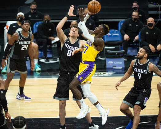 March 3, 2021, Sacramento, CA, USA: Los Angeles Lakers guard Dennis Schroder (17) goes up against Sacramento Kings forward Nemanja Bjelica (8) in the second quarter during a game at Golden 1 Center on Wednesday, Mar. 3, 2021 in Sacramento. Sacramento USA - ZUMAj89_ 20210303_zaf_j89_013 Copyright: xPaulxKitagakixJr.x