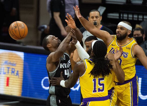 March 3, 2021, Sacramento, CA, USA: Sacramento Kings forward Harrison Barnes (40) is fouled surrounded by Los Angeles Lakers center Montrezl Harrell (15),Los Angeles Lakers guard Talen Horton-Tucker (5) and Los Angeles Lakers forward Jared Dudley (10) in the second quarter during a game at Golden 1 Center on Wednesday, Mar. 3, 2021 in Sacramento. Sacramento USA - ZUMAj89_ 20210303_zaf_j89_014 Copyright: xPaulxKitagakixJr.x
