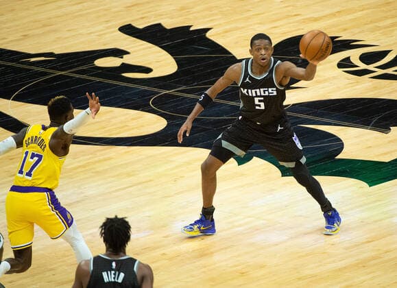 March 3, 2021, Sacramento, CA, USA: Sacramento Kings guard De Aaron Fox (5) looks to pass the ball defended by Los Angeles Lakers guard Dennis Schroder (17) in the third quarter during a game at Golden 1 Center on Wednesday, Mar. 3, 2021 in Sacramento. Sacramento USA - ZUMAj89_ 20210303_zaf_j89_015 Copyright: xPaulxKitagakixJr.x