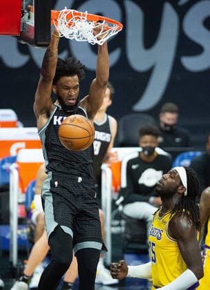 March 3, 2021, Sacramento, CA, USA: Sacramento Kings forward Marvin Bagley III (35) dunks the ball over Los Angeles Lakers center Montrezl Harrell (15) in the fourth quarter during a game at Golden 1 Center on Wednesday, Mar. 3, 2021 in Sacramento. The Kings win 123-121. Sacramento USA - ZUMAj89_ 20210303_zaf_j89_018 Copyright: xPaulxKitagakixJr.x