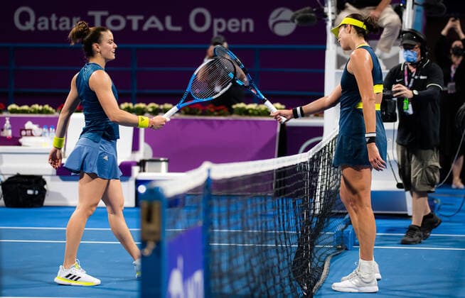 March 4, 2021, DOHA, QATAR: Maria Sakkari of Greece & Garbine Muguruza of Spain at the net after the quarter-final at the 2021 Qatar Total Open WTA, Tennis Damen 500 tournament DOHA QATAR - ZUMAa181 20210304_zaa_a181_103 Copyright: xRobxPrangex