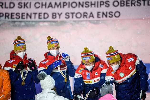 210305 Pal Golberg, Emil Iversen, Hans Christer Holund and Johannes Hosflot Klaebo of Norway celebrate at a medal ceremony for Men s Cross Country Skiing 4x10 Relay during the FIS Nordic Ski World Championships on March 5, 2021 in Oberstdorf Photo Johanna Lundberg BILDBYRAN kod JL JL0099 ski cross country skiing cross country fis nordic world ski championships world cup world cup ski world cup medal ceremony medal ceremony 9 bbeng cheers,  Copyright: JOHANNAxLUNDBERG BB210305JL133