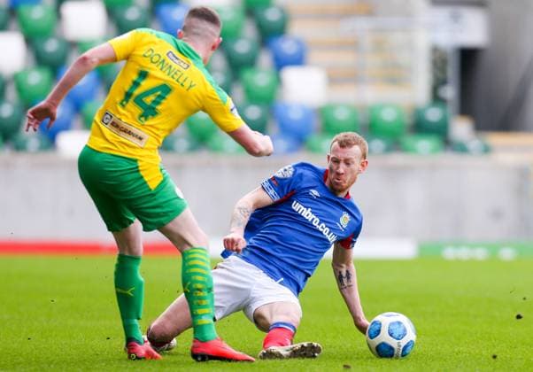 Danske Bank Premiership, Windsor Park, Belfast, Northern Ireland 6 3 2021 Linfield vs Cliftonville Linfield™s Michael Newberry with Aaron Donnelly of Cliftonville Michael Newberry with Aaron Donnelly 6 3 2021  Copyright: x INPHO Presseye MattxMackeyx Peye060321mm01_02