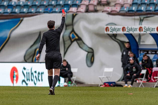 Rostock, Germany 06 March 2021 3 Liga 2020 2021 FC Hansa Rostock vs 1 FC Kaiserslautern Referee Manuel Gräfe Graefe Berlin shows red, red card, sending off to coach Marco Antwerpen 1 FC Kaiserslautern DFB regulations prohibit any use of photographs as image sequences and or quasi video Ostseestadion Mecklenburg Vorpommern Copyright: xFotostandx xVoelkerx