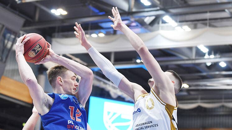 Basketball 1 Bundesliga, season 2020 2021, 22 matchday, Syntainics MBC Weissenfels vs Basketball Löwen Braunschweig 06 02 2021 Duel for the ball between Philipp Hartwich MBC Weissenfels, back number 12 and Lukas Wank Guard Braunschweig, back number 100 re during the match MBC Weissenfels vs Braunschweig 06 03 2021 Weissenfels Saxony Anhalt Germany Stadthalle Weissenfels
