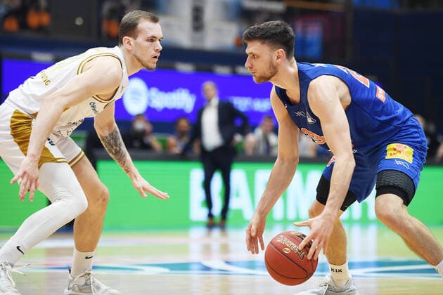 Basketball 1 Bundesliga, season 2020 2021, 22 matchday, Syntainics MBC Weissenfels vs Basketball Löwen Braunschweig 06 02 2021 Duel for the ball between Michal Michalak MBC Weissenfels, back number 23 r and Arnas Velicka Guard Braunschweig, back number 24 li during the match MBC Weissenfels vs Braunschweig 06 03 2021 Weissenfels Saxony Anhalt Germany Stadthalle Weissenfels