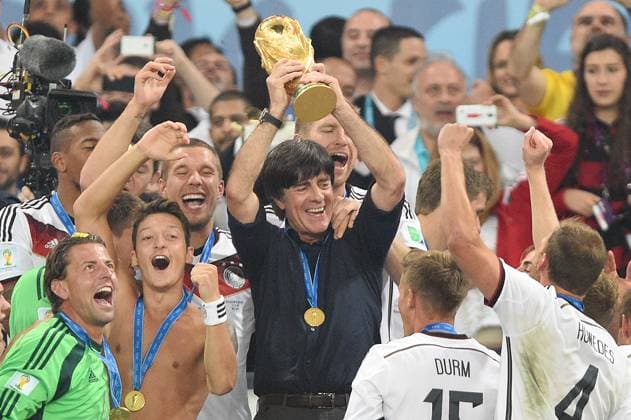 Joachim Loew After the European Football Championship 2021 he resigns from his post as national coach national coach Joachim Jogi LOEW,LöĶW GER with trophy,around him his players,jubilation,joy,enthusiasm,team photo,team,team,team photo award ceremony,honorary tribune,cup,trophy,trophaee Germany GER Argentina ARG 1 0 n V final,final,game 64, on 13 07 2014 in Rio de Janeiro Football World Cup 2014 in Brazil from 12 06 13 07 2014 ¬Â
