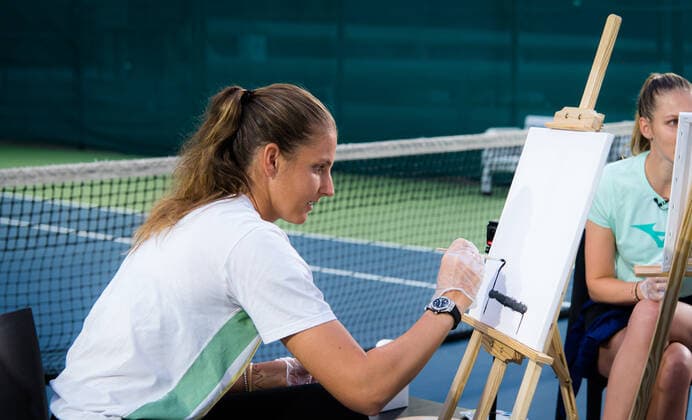 March 9, 2021, DUBAI, UNITED ARAB EMIRATES: Karolina Pliskova & Kristyna Pliskova of the Czech Republic paint the Dubai Duty Free Tennis Championships trophy at the 2021 Dubai Duty Free Tennis Championships WTA, Tennis Damen 1000 tournament DUBAI UNITED ARAB EMIRATES - ZUMAa181 20210309_zaa_a181_102 Copyright: xRobxPrangex