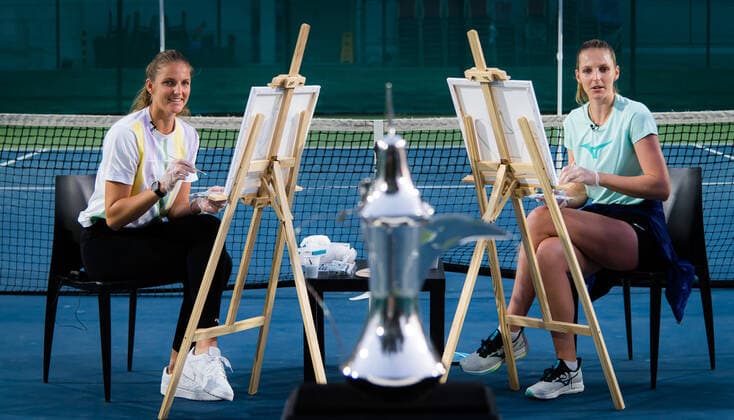 March 9, 2021, DUBAI, UNITED ARAB EMIRATES: Karolina Pliskova & Kristyna Pliskova of the Czech Republic paint the Dubai Duty Free Tennis Championships trophy at the 2021 Dubai Duty Free Tennis Championships WTA, Tennis Damen 1000 tournament DUBAI UNITED ARAB EMIRATES - ZUMAa181 20210309_zaa_a181_103 Copyright: xRobxPrangex
