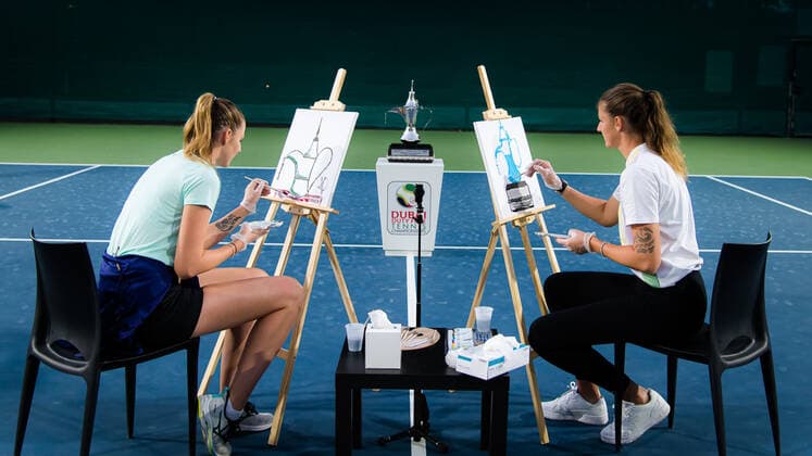 March 9, 2021, DUBAI, UNITED ARAB EMIRATES: Karolina Pliskova & Kristyna Pliskova of the Czech Republic paint the Dubai Duty Free Tennis Championships trophy at the 2021 Dubai Duty Free Tennis Championships WTA, Tennis Damen 1000 tournament DUBAI UNITED ARAB EMIRATES - ZUMAa181 20210309_zaa_a181_105 Copyright: xRobxPrangex