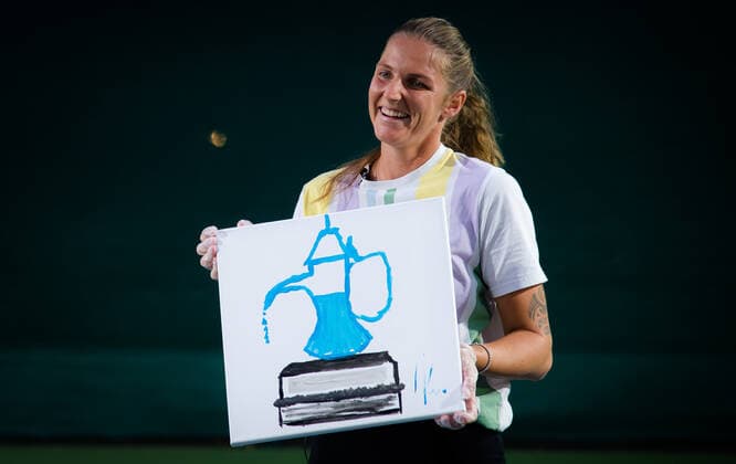 March 9, 2021, DUBAI, UNITED ARAB EMIRATES: Karolina Pliskova & Kristyna Pliskova of the Czech Republic paint the Dubai Duty Free Tennis Championships trophy at the 2021 Dubai Duty Free Tennis Championships WTA, Tennis Damen 1000 tournament DUBAI UNITED ARAB EMIRATES - ZUMAa181 20210309_zaa_a181_109 Copyright: xRobxPrangex