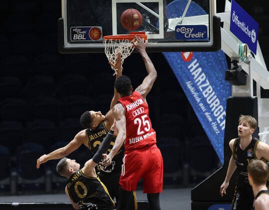 Lukas Wank Basketball Loewen Braunschweig , Karim Jallow Basketball Loewen Braunschweig , JaJuan Johnson FC Bayern Muenchen