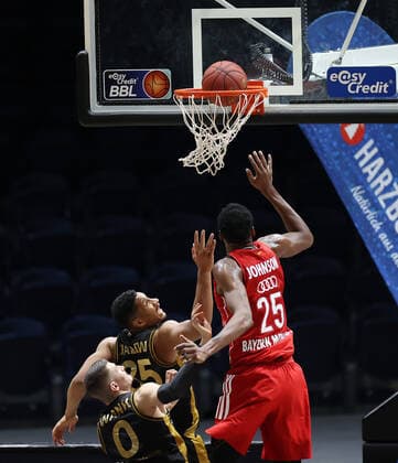 Lukas Wank Basketball Loewen Braunschweig , Karim Jallow Basketball Loewen Braunschweig , JaJuan Johnson FC Bayern Muenchen