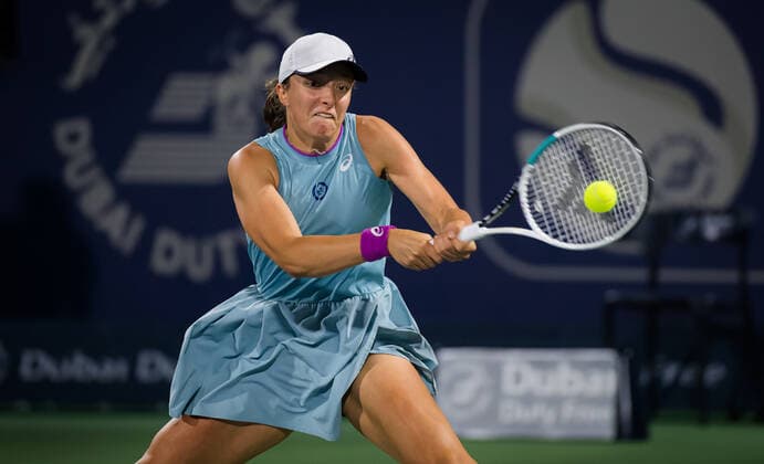 March 10, 2021, DUBAI, UNITED ARAB EMIRATES: Iga Swiatek of Poland in action during her third round match at the 2021 Dubai Duty Free Tennis Championships WTA, Tennis Damen 1000 tournament against Garbine Muguruza of Spain DUBAI UNITED ARAB EMIRATES - ZUMAa181 20210310_zaa_a181_118 Copyright: xRobxPrangex