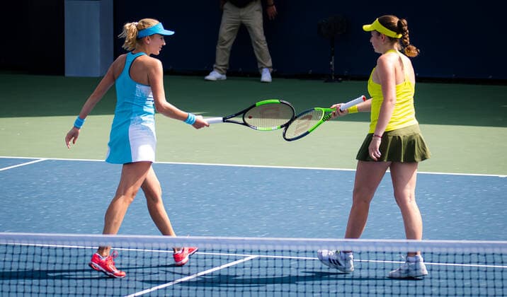 March 11, 2021, DUBAI, UNITED ARAB EMIRATES: Jelena Ostapenko of Latvia & Lyudmyla Kichenok of Ukraine playing doubles at the 2021 Dubai Duty Free Tennis Championships WTA, Tennis Damen 1000 tournament DUBAI UNITED ARAB EMIRATES - ZUMAa181 20210311_zaa_a181_008 Copyright: xRobxPrangex