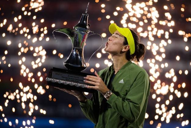 March 13, 2021, Dubai, United Arab Emirates: GARBINE MUGURUZA of Spain with the champions trophy after the final of the 2021 Dubai Duty Free Tennis Championships WTA, Tennis Damen 1000 tournament Dubai United Arab Emirates - ZUMAa181 20210313_zaa_a181_246 Copyright: xRobxPrangex