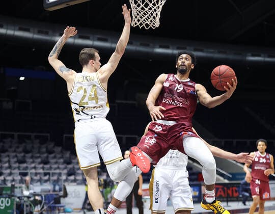 Arnas Velicka Basketball Loewen Braunschweig in duel with Jonathan Williams Chemnitz99