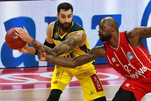 21 James Gist FCBB red vs 12 Martin Breunig Oldenburg yellow Basketball, 1 Bundesliga, BBL, FC Bayern Munich vs EWE Baskets Oldenburg at Audi Dome, 14 03 2021 PHOTO Mladen Lackovic LakoPress