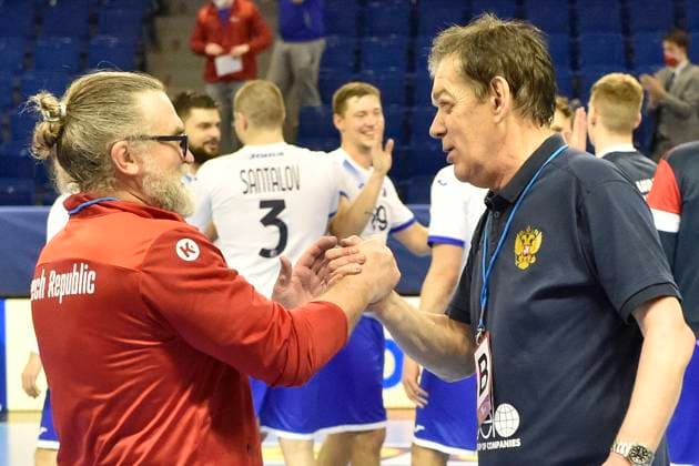 (L-R) Czech coach RASTISLAV TRTIK shakes hands with coach of Russia VELIMIR PETKOVIC during the European men’s handball championship qualification group 3 match Czech Republic vs Russia in Brno, Czech Republic, March 14, 2021. (CTKxPhoto VaclavxSalek) CTKPhotoP202103140724401  sal 16