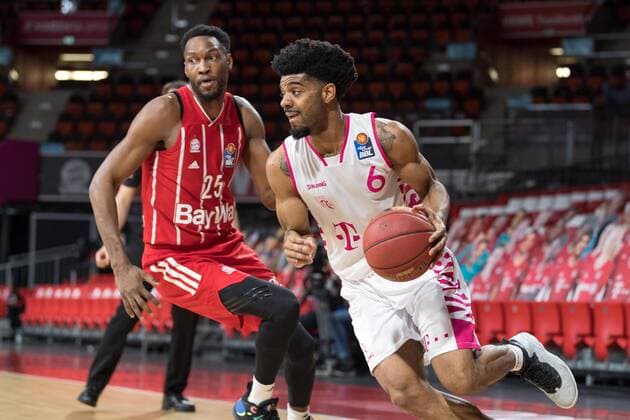 Basketball, BBL, 20210316, FC Bayern München Telekom Basket Bonn Pictured JaJuan JOHNSON FC Bayern München, 25 and Jalen HUDSON Telekom Baskets Bonn, 6 Munich Audi Dome Bayern Germany Copyright: Passion2Press MarkusxFischerx