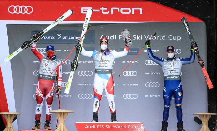 ALPINE SKIING - FIS WC Final Lenzerheide LENZERHEIDE,SWITZERLAND,17.MAR.21- ALPINE SKIING - FIS World Cup Final, award ceremony for the Downhill World Cup, men. Image shows the rejoicing of Matthias Mayer (AUT), Beat Feuz (SUI) and Dominik Paris (ITA). Keywords: crystal globe. GEPAxpictures xMarioxBuehner