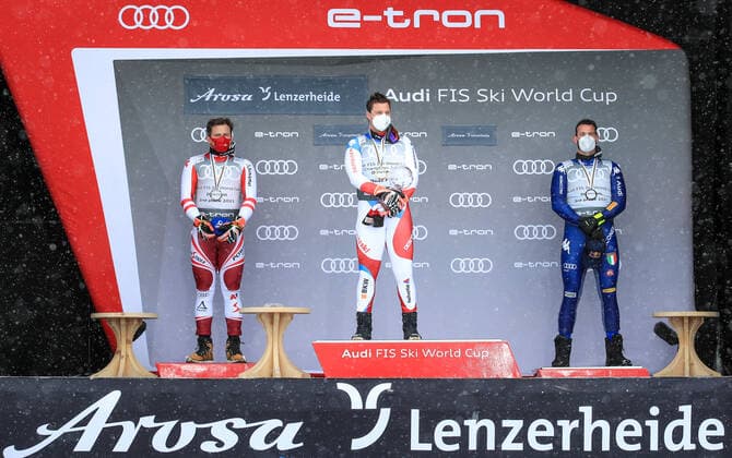 ALPINE SKIING - FIS WC Final Lenzerheide LENZERHEIDE,SWITZERLAND,17.MAR.21- ALPINE SKIING - FIS World Cup Final, award ceremony for the Downhill World Cup, men. Image shows Matthias Mayer (AUT), Beat Feuz (SUI) and Dominik Paris (ITA). Keywords: crystal globe. GEPAxpictures xMarioxBuehner