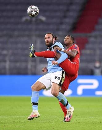 FOOTBALL CHAMPIONS LEAGUE SEASON 2020 2021 Round of 16 second leg 17 03 2021 FC Bayern Muenchen Lazio Roma David Alaba r, FC Bayern Muenchen vs Vedat Muriqi li, Lazio Roma