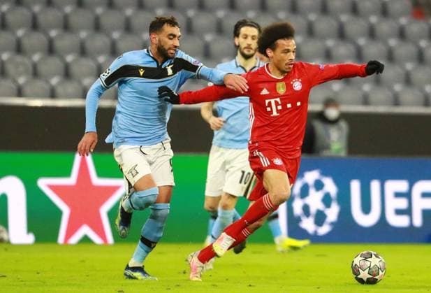 Leroy Sane FCB red against Vedat Muriqi Lazio Roma Football, Champions League, FC Bayern Munich Lazio Roma, 17 03 2021 PHOTO Mladen Lackovic LakoPress