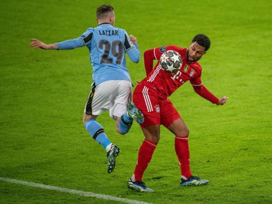 Manuel Lazzari Lazio Rom, 29 , Serge Gnabry FC Bayern Muenchen, 07 , GER, FC Bayern Muechen vs Lazio Rom, Football, Champions League, Round of 16, Second leg, Season 2020 2021, 17 03 2021, DFB DFL regulations prohibit any use of photographs as image sequences and or quasi video , GER, FC Bayern Muechen vs Lazio Rom, Football, Champions League, Round of 16, Second leg, Season 2020 2021, 17 03 2021 Muenchen Copyright: xEIBNER SaschaxWaltherx EP_EER