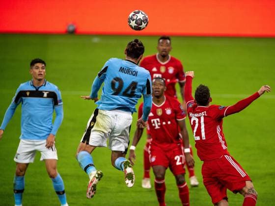 Vedat Muriqi Lazio Roma, 94 , Lucas Hernandez FC Bayern Muenchen, 21 , GER, FC Bayern Muechen vs Lazio Roma, Football, Champions League, Round of 16, Second leg, Season 2020 2021, 17 03 2021, DFB DFL regulations prohibit any use of photographs as image sequences and or quasi video , GER, FC Bayern Muechen vs Lazio Rom, Fussball, Champions League, Achtelfinale, Rueckspiel, Saison 2020 2021, 17 03 2021 Muenchen Copyright: xEIBNER SaschaxWaltherx EP_EER
