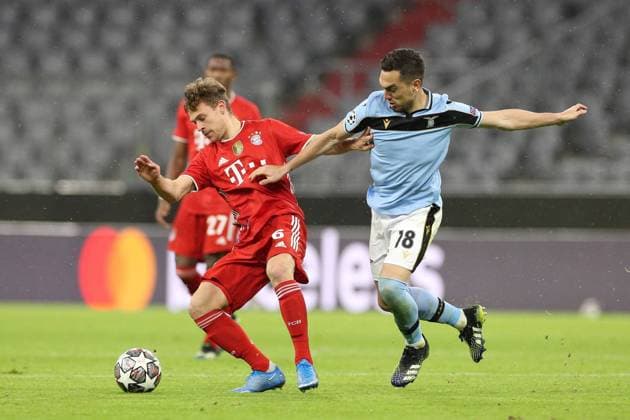 l r in duel, action, with Joshua Kimmich 6 FC Bayern Muenchen and Gonzalo Escalante 18 Lazio Rom , FC Bayern Muenchen vs Lazio Rom, Champions League, Round of 16, 17 03 2021 Muenchen Bayern Germany Copyright: xkolbert-press ChristianxKolbertx