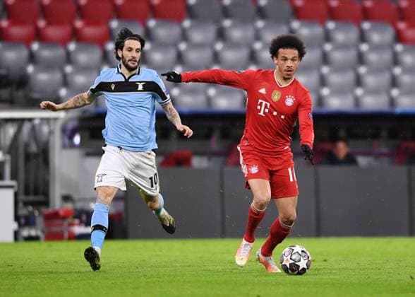 FOOTBALL CHAMPIONS LEAGUE SEASON 2020 2021 Round of 16 Second leg 17 03 2021 FC Bayern Muenchen Lazio Roma Leroy Sane right, FC Bayern Muenchen vs Luis Alberto left, Lazio Roma