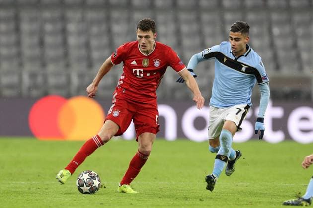l r in duel, action, with Benjamin Pavard 5 FC Bayern Muenchen and Andreas Pereira 7 Lazio Roma , FC Bayern Muenchen vs Lazio Roma, Champions League, Round of 16, 17 03 2021 Muenchen Bayern Germany Copyright: xkolbert-press ChristianxKolbertx