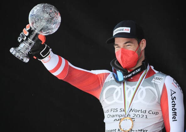 ALPINE SKIING - FIS WC Final Lenzerheide LENZERHEIDE,SWITZERLAND,18.MAR.21- ALPINE SKIING - FIS World Cup Final, award ceremony for the Super G World Cup, men. Image shows the rejoicing of Vincent Kriechmayr (AUT). keywords: crystal globe. GEPAxpictures xMarioxBuehner