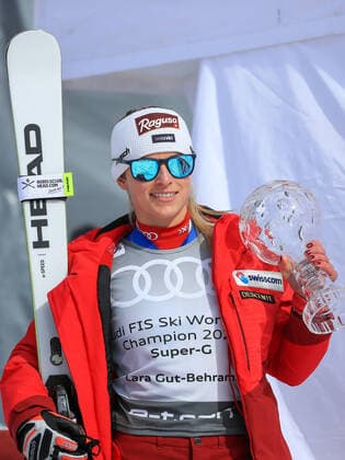 ALPINE SKIING - FIS WC Final Lenzerheide LENZERHEIDE,SWITZERLAND,18.MAR.21- ALPINE SKIING - FIS World Cup Final, award ceremony for the Super G World Cup, ladies. Image shows the rejoicing of Lara Gut-Behrami (SUI)). keywords: crystal globe. GEPAxpictures xMarioxBuehner