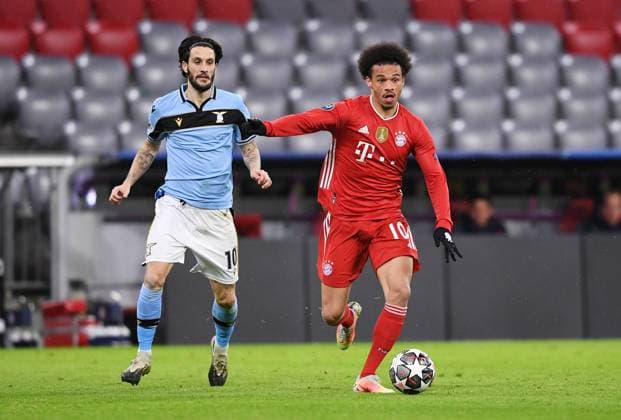 FOOTBALL CHAMPIONS LEAGUE SEASON 2020 2021 Round of 16 Second leg 17 03 2021 FC Bayern Muenchen Lazio Roma Leroy Sane right, FC Bayern Muenchen vs Luis Alberto left, Lazio Roma