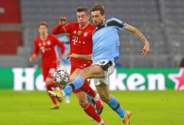 9 Robert Lewandowski FCB vs 33 Francesco Acerbi Lazio Roma Football, Champions League, FC Bayern Munich Lazio Roma, 17 03 2021 PHOTO Mladen Lackovic LakoPress