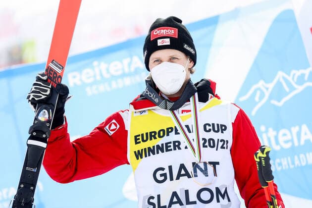 ALPINE SKIING - FIS EC Reiteralm SCHLADMING,AUSTRIA,18.MAR.21- ALPINE SKIING - FIS Europa Cup Final, award ceremony for the Giant Slalom Europa Cup, men. Image shows the rejoicing of Dominik Raschner (AUT). Keywords: medal. GEPAxpictures xChristianxWalgram