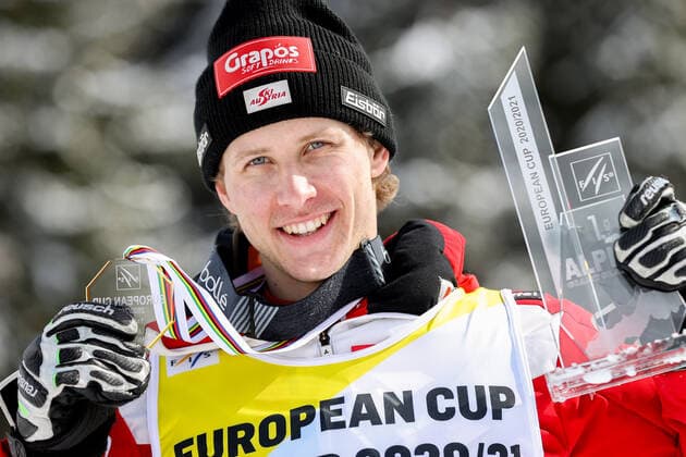 ALPINE SKIING - FIS EC Reiteralm SCHLADMING,AUSTRIA,18.MAR.21- ALPINE SKIING - FIS Europa Cup Final, award ceremony for the Giant Slalom Europa Cup, men. Image shows Dominik Raschner (AUT). Keywords: medal, trophy. GEPAxpictures xChristianxWalgram