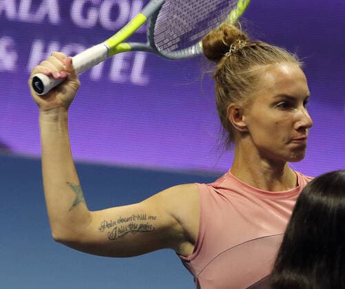 ST PETERSBURG, RUSSIA â€“ MARCH 19, 2021: Russiaâ€™s Svetlana Kuznetsova is seen before a 2021 WTA, Tennis Damen Premier St Petersburg Ladies Trophy quarterfinal singles match against Romaniaâ€™s Cristian at Sibur Arena. Kuznetsova has a tattoo on hre arm with a message reading Pain doesn t kill me, I kill pain . Alexander Demianchuk TASS  TS0F9E61