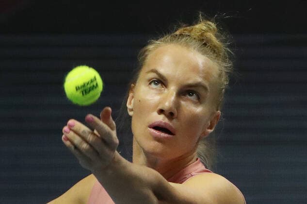 ST PETERSBURG, RUSSIA â€“ MARCH 19, 2021: Russiaâ€™s Svetlana Kuznetsova serves in a 2021 WTA, Tennis Damen Premier St Petersburg Ladies Trophy quarterfinal singles match against Romaniaâ€™s Cristian at Sibur Arena. Alexander Demianchuk TASS  TS0F9E62