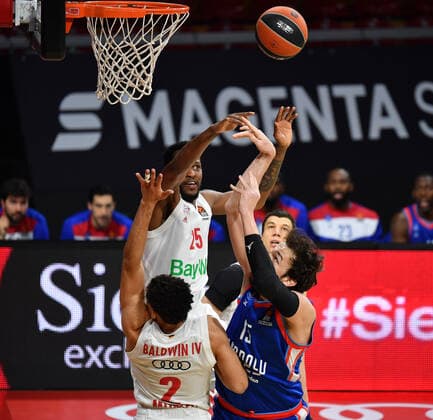 JaJuan Johnson FCB action,one-on-one against SERTAC SANILI IS under the basket Basketball EuroLeague Matchday 30 FC Bayern Muenchen Anadolu Efes Istanbul on 19 03 2021 A U D I D O M E