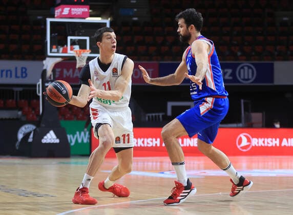 19 03 2021, EuroLeague, FC Bayern Basketball vs Anadolu Efes, Audi Dome Munich, in picture Vladimir Lucic FCB Basketball vs Sertac Sanli Anadolu Efes