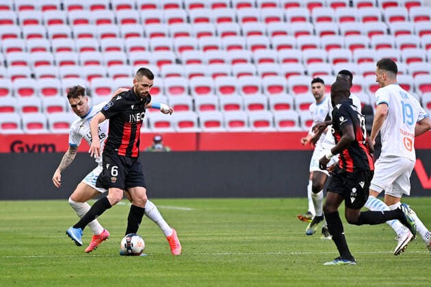 06 MORGAN SCHNEIDERLIN (NICE) - 29 POL LIROLA (OM) FOOTBALL : Nice vs Marseille - Ligue 1 Uber Eats - 20 03 2021 FEP Panoramic 